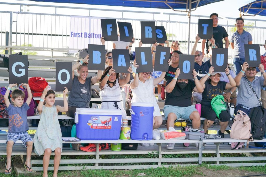 Family members, colleagues, and friends show their support to the team