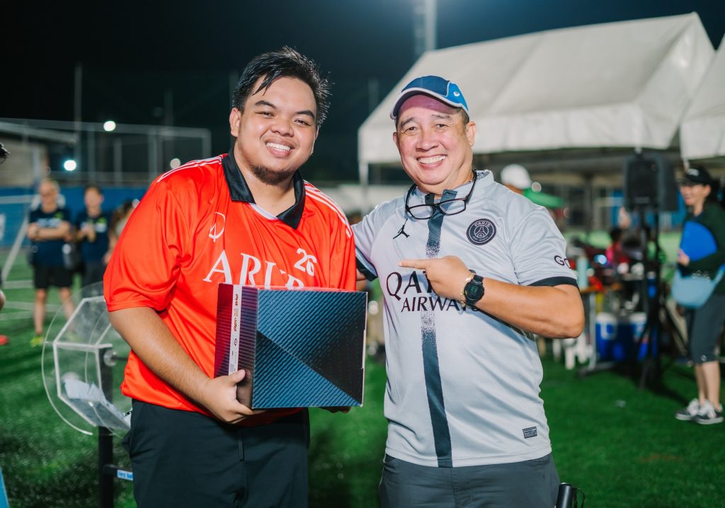 Winner of the Ligue 1 Official Match Ball (L) with First Balfour Head of Strategic Business Planning Vicente de Lima (R)